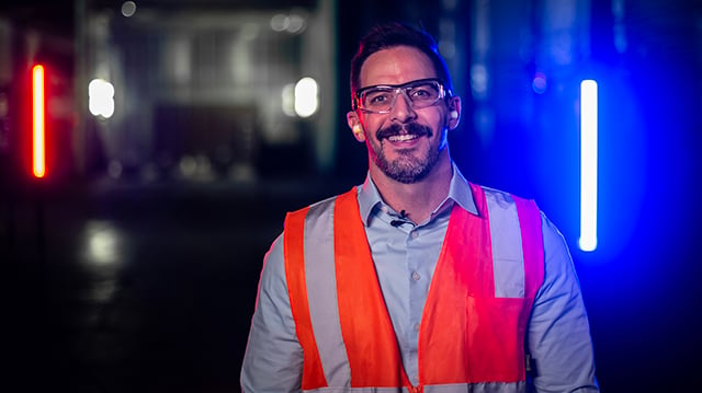 smiling engineer in data center.jpg