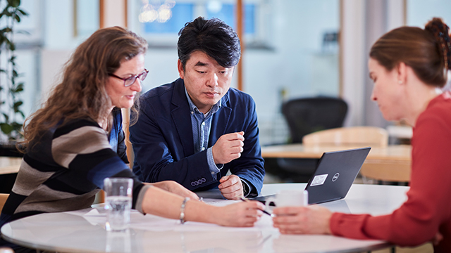 process experts discussing at table.jpg